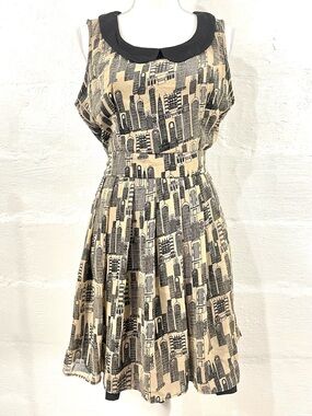 YUMI SLEEVELESS SKATER DRESS WITH WAIST TIE